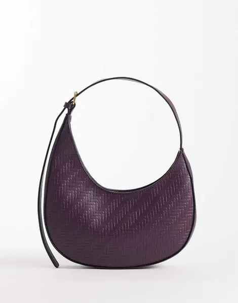 ASOS DESIGN asymmetric scoop shoulder bag with buckle detail in burgundy weave